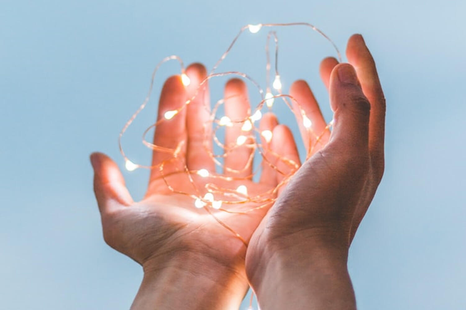 Early Childhood Centre - Hands Holding String Light