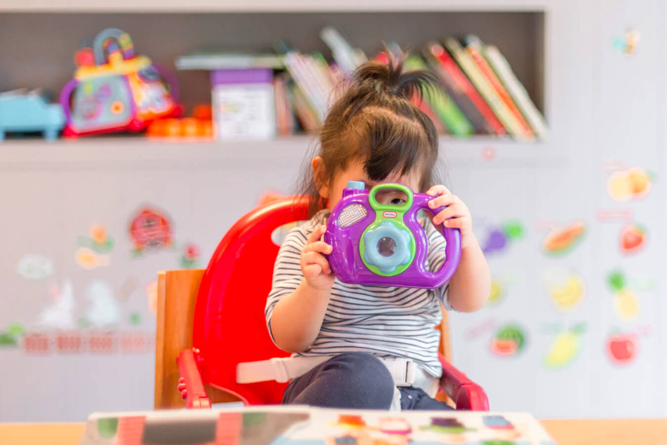 Child Playing with Toy in Early Childhood Centre