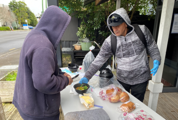 Lee Peri, Lifewise Housing First Peer Support Worker, serving one of our street whanau some fresh and warm boil-up after getting their vaccine.
